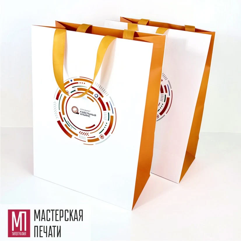 Пакет бумажный оранжевый с ручками лентами